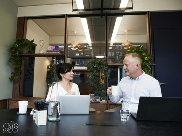 Business owners meeting with a marketing agency to discuss goals