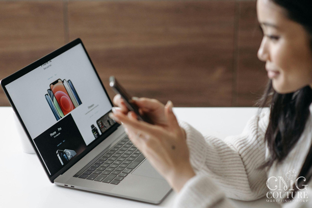 User browsing a modern website on laptop and phone